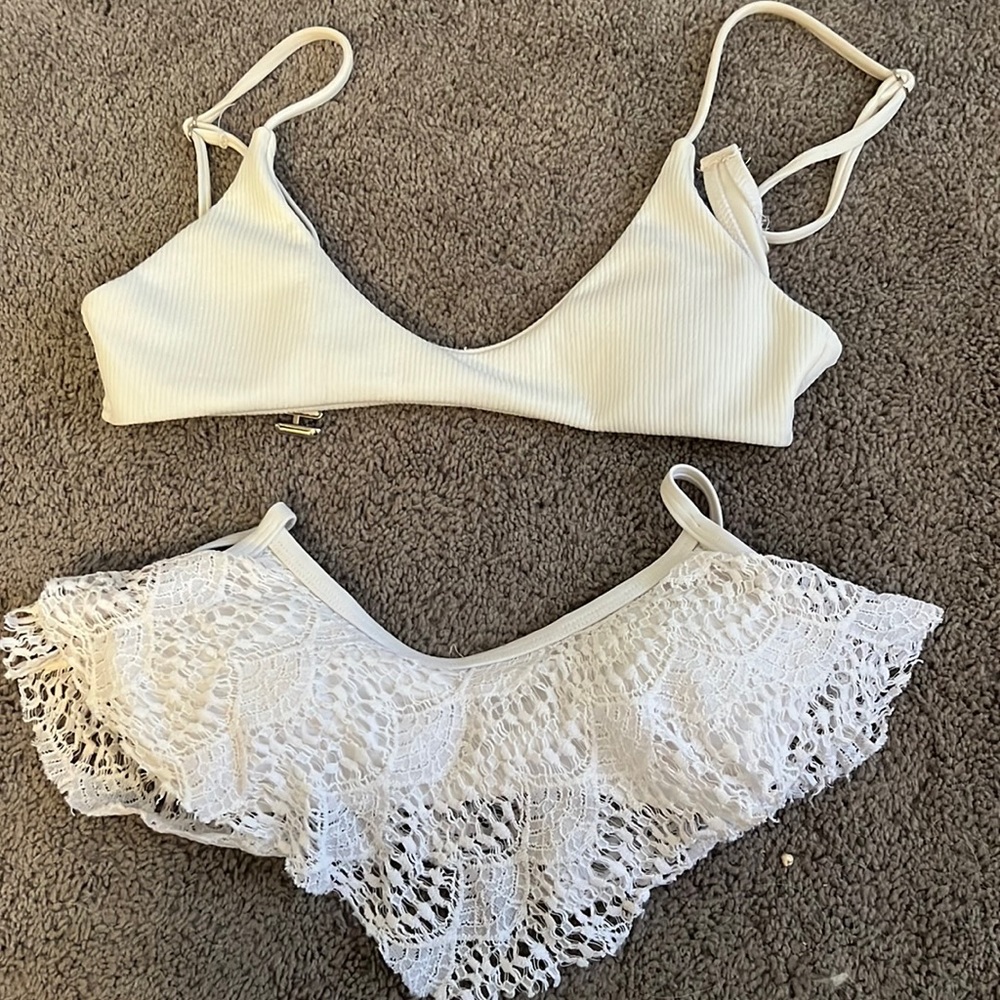 SOLD Two white bikini tops